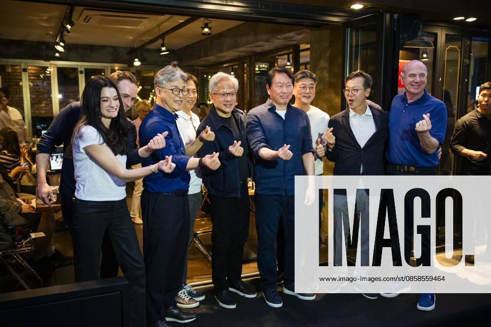 Nvidia founder and CEO JENSEN HUANG and SK Group chairman CHEY TAE-WON pose for a photo after eating fried chicken and drinking beer at Kkanbu Chicken, during Huangâ€⠢s visit to Seoul, South Korea on Sunday, June 7, 2026. Seoul South Korea - ZUMAh163 20260607_znp_h163_032