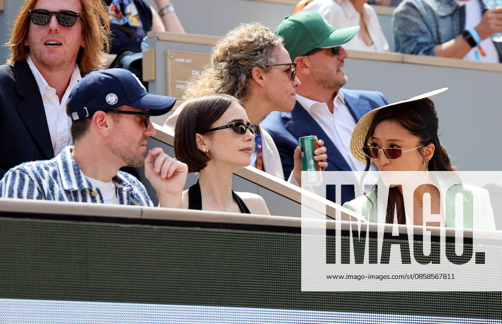 Lily Collins with husband Charlie McDowell and Ashley Park Celebrities in the stands at the mens final of the French Open at Roland Garros 2026 on June 7, 2026 Jacovides Moreau Bestimage Celebrities in the stands at the mens final of the French Open at Roland Garros 2026 on June 7, 2026 Paris France