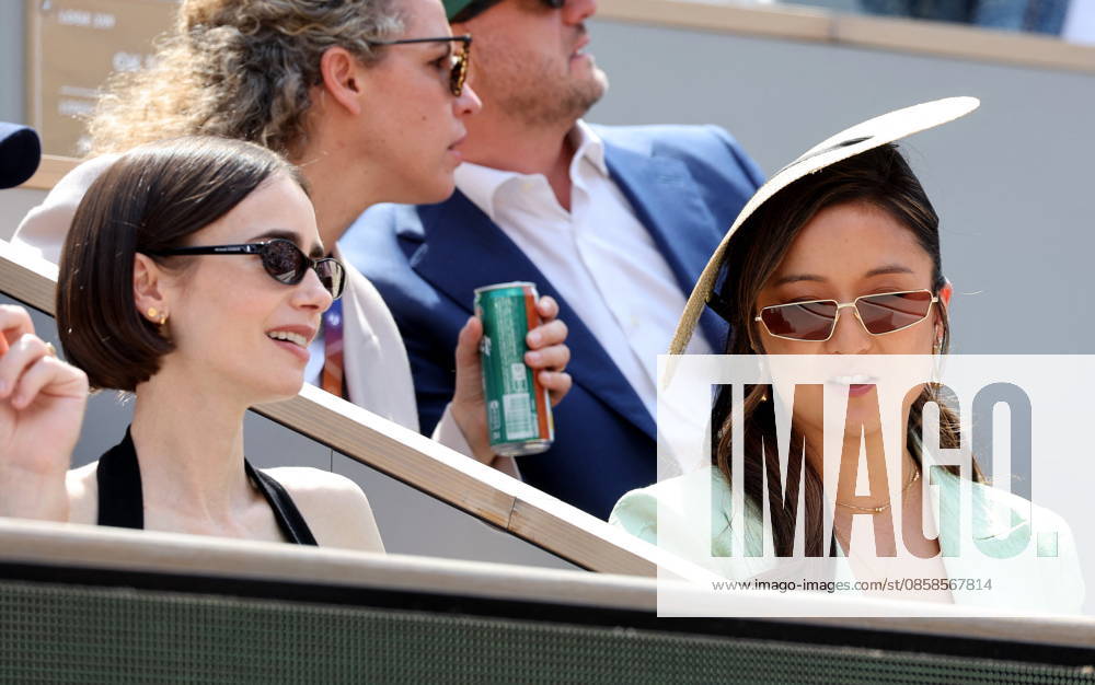 Lily Collins and Ashley Park Celebrities in the stands at the mens final of the French Open at Roland Garros 2026 on June 7, 2026 Jacovides Moreau Bestimage Celebrities in the stands at the mens final of the French Open at Roland Garros 2026 on June 7, 2026 Paris France