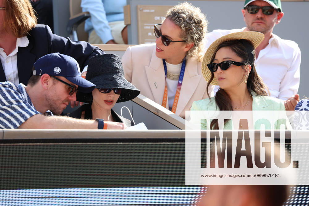 Lily Collins, Charlie McDowell and Ashley Park attend Men s Singles final match of the 2026 French Open at Roland Garros in Paris Lily Collins, Charlie McDowell and Ashley Park attend Men s Singles final match of the 2026 French Open at Roland Garros in Paris, France on June 7, 2026