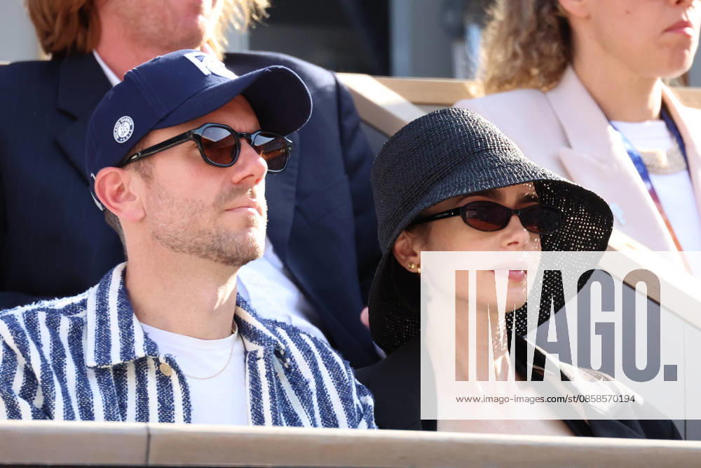 Lily Collins, Charlie McDowell and Ashley Park attend Men s Singles final match of the 2026 French Open at Roland Garros in Paris Lily Collins, Charlie McDowell and Ashley Park attend Men s Singles final match of the 2026 French Open at Roland Garros in Paris, France on June 7, 2026
