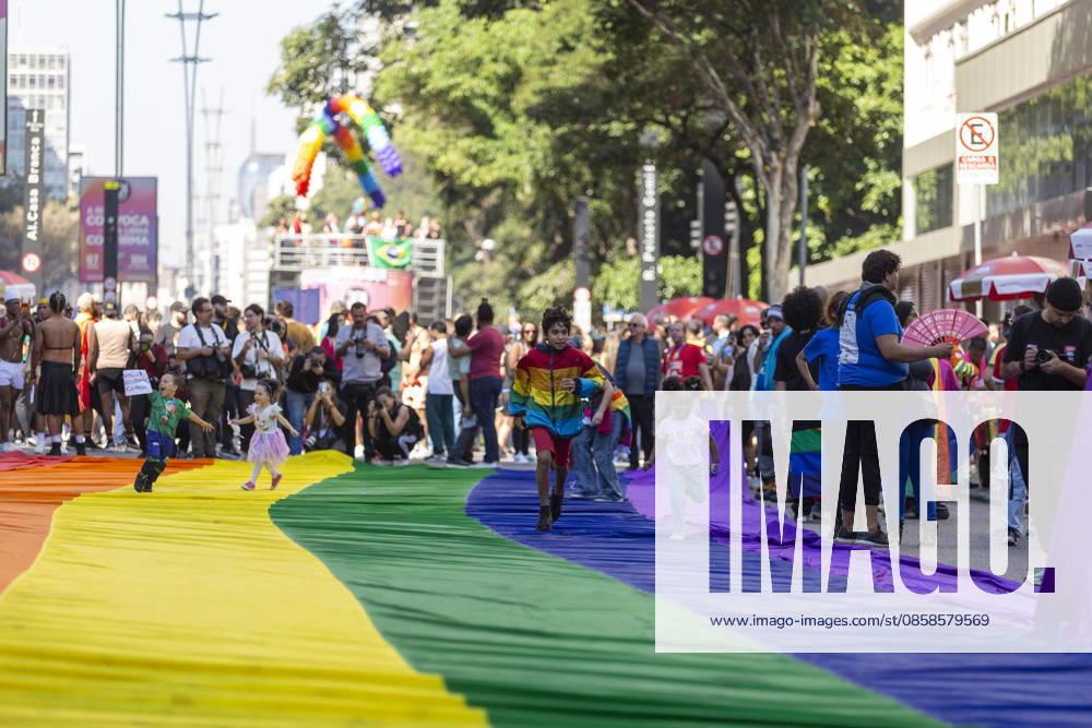 JUNE 07, 2026: Participants gather during the 30th edition of the Sao Paulo LGBT+ Pride Parade at Paulista Avenue in Sao Paulo, Brazil, on June 7, 2026. Widely considered the largest Pride parade in the world, this year s landmark 30-year anniversary featured the official theme A rua convoca, a urna confirma (The street summons, the ballot box confirms), emphasizing political participation and social mobilization ahead of municipal and general elections. Despite facing a 60% drop in private corporate sponsorshipsâ€which forced 14 sound trucks onto the avenue instead of the usual 17â€millions of people took to the streets to protest conservative legislative backlashes and celebrate - ZUMAv146 20260607_zip_v146_011