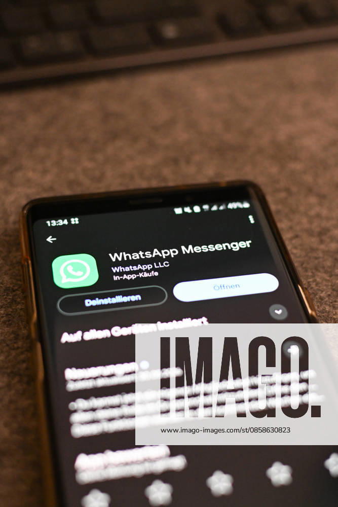 The logo of the messenger service WhatsApp on the display of a smartphone WhatsApp is one of the worlds most widely used communication services for messages, voice and video calls Bad Wörishofen Bavaria Germany