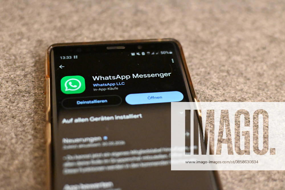The logo of the messenger service WhatsApp on the display of a smartphone WhatsApp is one of the worlds most widely used communication services for messages, voice and video calls Bad Wörishofen Bavaria Germany