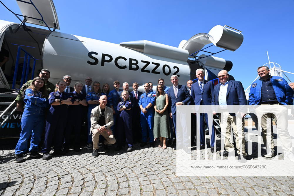 From left: American astronaut Andrew Feustel (crouching), SPD Minister of Defense Jaromir Zuna (in the background), next to him on the right, Prime Minister Andrej Babis (ANO), future Czech astronaut and pilot Ales Svoboda, Minister of Industry and Trade Karel Havlicek (ANO), U.S. Ambassador to the Czech Republic Nicholas Merrick, the first Czechoslovak cosmonaut Vladimir Remek, and, far right, Danish ESA astronaut Andreas Mogensen pose with participants of the Zero-G mission in front of the SpaceBuzz mobile rocket, which offers visitors a virtual journey into space and a view of Earth through the eyes of astronauts, within an an event for the Czech Journey to Space project, featuring an educational program and a virtual space mission, at CTKPhotoP2026060805679