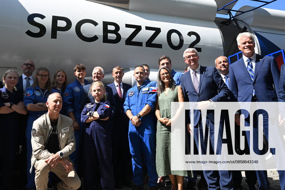 From left: American astronaut Andrew Feustel (crouching), SPD Minister of Defense Jaromir Zuna (in the background), next to him on the right, Prime Minister Andrej Babis (ANO), future Czech astronaut and pilot Ales Svoboda, Minister of Industry and Trade Karel Havlicek (ANO) and U.S. Ambassador to the Czech Republic Nicholas Merrick pose with participants of the Zero-G mission in front of the SpaceBuzz mobile rocket, which offers visitors a virtual journey into space and a view of Earth through the eyes of astronauts, within an an event for the Czech Journey to Space project, featuring an educational program and a virtual space mission, at Prague Exhibition Grounds, Prague Czech Republic, on June 8, 2026. (CTKxPhoto KaterinaxSulova) CTKP CTKPhotoP2026060805686