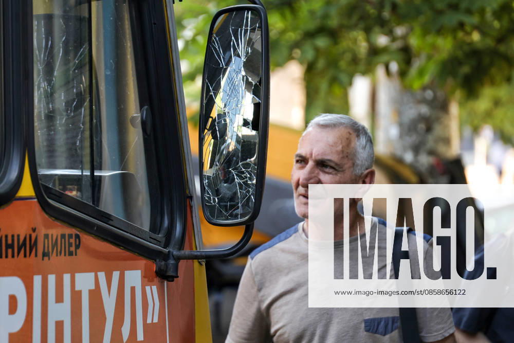 A man looks at a shared taxi damaged by a Russian drone attack, Odesa, Ukraine, June 8, 2026. Russian forces attacked the southern Ukrainian city with Shahed-type drones. The wreckage of a downed drone fell directly onto a public transport stop, damaging the stop itself, as well as a control room, and several shared taxis. Three people were injured. (Photo by Nina Liashonok Ukrinform) Russian troops attack Odesa and region with drones