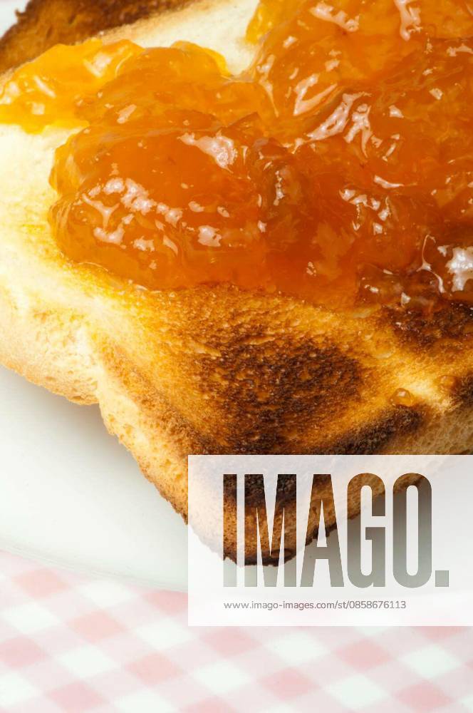 Spread jam on bread