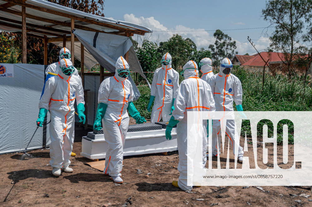 Healthcare workers take measures against Ebola outbreak at hospital in DRC ITURI, DEMOCRATIC REPUBLIC OF THE CONGO - JUNE 08: Health workers, wearing protective gear, retrieve the body of a citizen who died of Ebola virus from the Rwampara Hospital morgue for burial procedures, as teams carry out disinfection work at the hospital, considered the epicenter of the outbreak, in the Ituri province of the Democratic Republic of the Congo on June 08, 2026. Stringer Anadolu Democratic Republic of the Congo Ituri. Editorial use only. Please get in touch for any other usage.