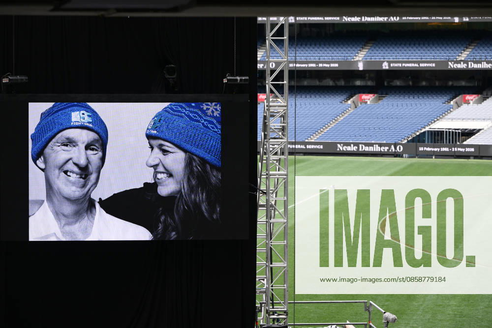 NEALE DANIHER STATE FUNERAL, An image of Neale and Bec Daniher on a screen during a State Funeral Service for Neale Daniher at the MCG, Melbourne, Wednesday, June 10, 2026. A state funeral will honour the life and extraordinary achievements of AFL great Neale Daniher, whose fight against MND inspired countless Australians. ( NO ARCHIVING MELBOURNE VICTORIA AUSTRALIA