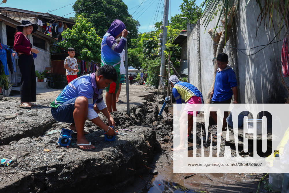 Nearly 88,000 affected by 7.8-magnitude quake, 22,690 remain displaced in Southern Philippines GENERAL SANTOS, PHILIPPINES – JUNE 10: Residents work to repair water supply systems on a cracked road following a deadly earthquake in General Santos, Philippines, on June 10, 2026. Nearly 88,000 people across southern Mindanao have been affected by a magnitude 7.8 earthquake that struck southern Philippines on June 8, while more than 22,000 remain displaced as aftershocks continue, according to government and NGO figures. The quake has killed dozens of people, damaged infrastructure and homes, and caused residential buildings and poorly constructed houses to collapse, making it the strongest earthquake to hit the disaster-prone Southeast Asian c