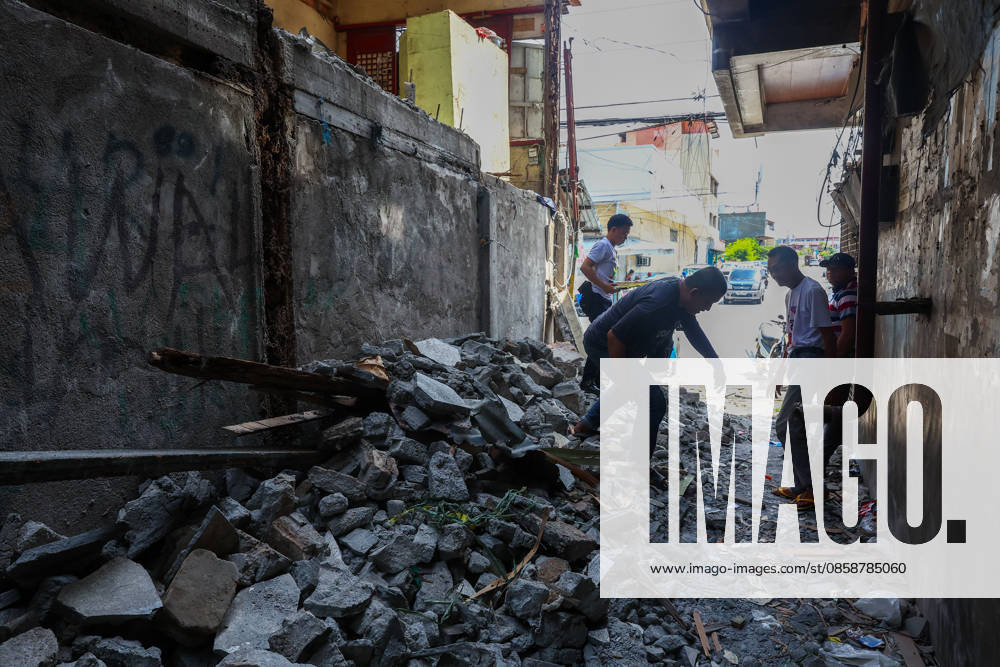 Nearly 88,000 affected by 7.8-magnitude quake, 22,690 remain displaced in Southern Philippines GENERAL SANTOS, PHILIPPINES – JUNE 10: People gather near the debris of a damaged building following a deadly earthquake in General Santos, Philippines, on June 10, 2026. Nearly 88,000 people across southern Mindanao have been affected by a magnitude 7.8 earthquake that struck southern Philippines on June 8, while more than 22,000 remain displaced as aftershocks continue, according to government and NGO figures. The quake has killed dozens of people, damaged infrastructure and homes, and caused residential buildings and poorly constructed houses to collapse, making it the strongest earthquake to hit the disaster-prone Southeast Asian country this