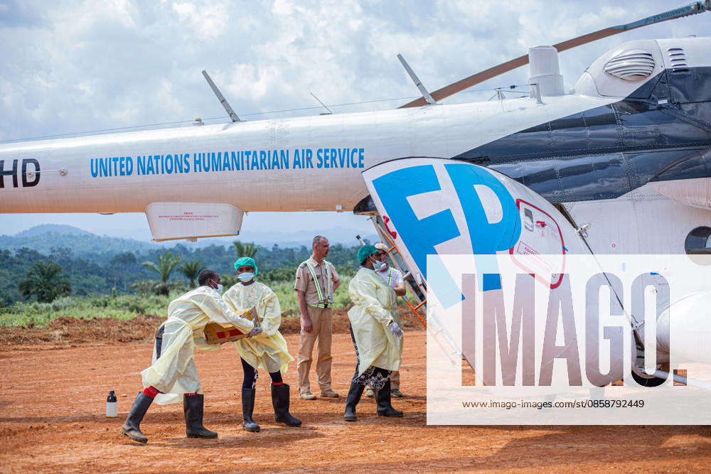 (260610) -- KINSHASA, June 10, 2026 () -- Medical workers in protective suits carry medical supplies against the Ebola epidemic in Mongbwalu, Ituri province, the Democratic Republic of the Congo, June 9, 2026. The number of confirmed Ebola cases in the Democratic Republic of the Congo (DRC) has risen to 598, including 115 deaths, the country s public health authorities said Tuesday. () (SpotNews) DR CONGO-ITURI-EBOLA OUTBREAK-HEALTH MEASURES Xinhua