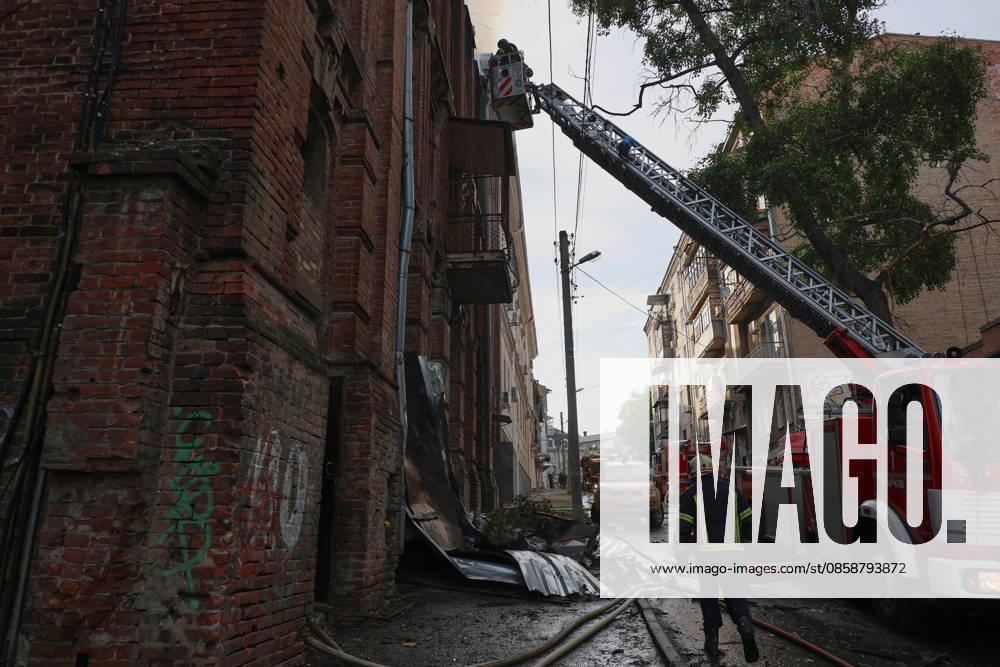A rescuer on an aerial platform extinguishes a fire that broke out in a three-story residential building damaged by a Russian drone attack in Kharkiv, Ukraine, on June 9, 2026. Russian forces attacked the city with strike drones. One of the UAVs hit a three-story residential building, causing a fire. The roof, floors, and structural elements of the upper stories were destroyed (Photo by Viacheslav Madiievskyi Ukrinform) Russian drone hits three-story residential building in Kharkiv
