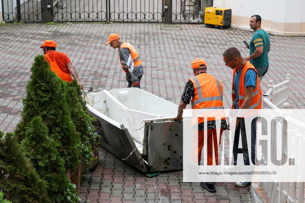Russian drone strike damages housing in Odesa Utility workers stand beside a refrigerator damaged in a Russian drone attack on Odesa, Ukraine, on June 10, 2026. The Russian army attacked the city with strike drones. Residential buildings were damaged in the attack. Three people were injured, including two children, Credit:Nina Liashonok Ukrinform Avalon Ukraine, Odesa