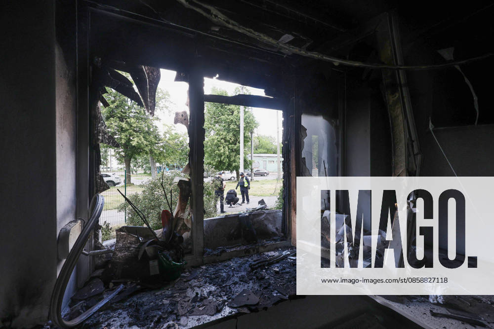 Law enforcement officers examine the wreckage of a strike drone used by Russian forces to attack a district of Kharkiv, Ukraine, June 10, 2026. Russian forces struck the northeastern city with drones, injuring at least eight people. One of the drones hit an apartment block, housing a dental office. (Photo by Viacheslav Madiievskyi Ukrinform) Russians damage dental office in Kharkiv