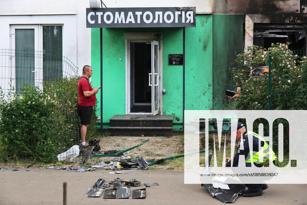 Russians damage dental office in Kharkiv A law enforcer squats by the wreckage of a Russian drone near a dental office, situated in an apartment block, Kharkiv, Ukraine, June 10, 2026. Russian forces struck the northeastern city with drones, injuring at least eight people. One of the drones hit an apartment block, housing a dental office., Credit:Viacheslav Madiievskyi Ukrinform Avalon Ukraine, Kharkiv