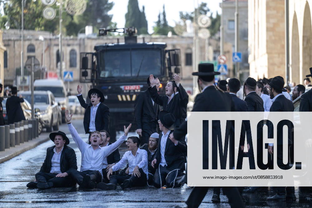 Police intervene as Ultra-Orthodox Jews block roads in West Jerusalem WEST JERUSALEM - JUNE 10: Israeli police use stun grenades and water cannons to disperse Ultra-Orthodox (Haredi) Jews blocking roads during a protest on June 10, 2026. Three demonstrators were detained during the incidents in West Jerusalem, where crowds gathered to protest against compulsory military service. Mostafa Alkharouf Anadolu Jerusalem Israel. Editorial use only. Please get in touch for any other usage.