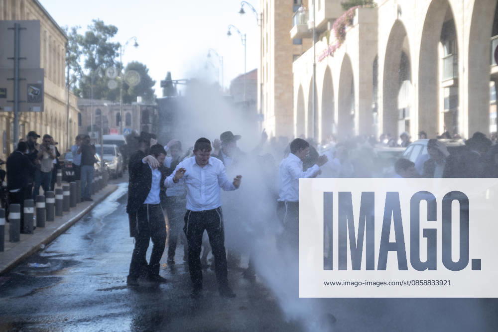 Police intervene as Ultra-Orthodox Jews block roads in West Jerusalem WEST JERUSALEM - JUNE 10: Israeli police use stun grenades and water cannons to disperse Ultra-Orthodox (Haredi) Jews blocking roads during a protest on June 10, 2026. Three demonstrators were detained during the incidents in West Jerusalem, where crowds gathered to protest against compulsory military service. Mostafa Alkharouf Anadolu Jerusalem Israel. Editorial use only. Please get in touch for any other usage.