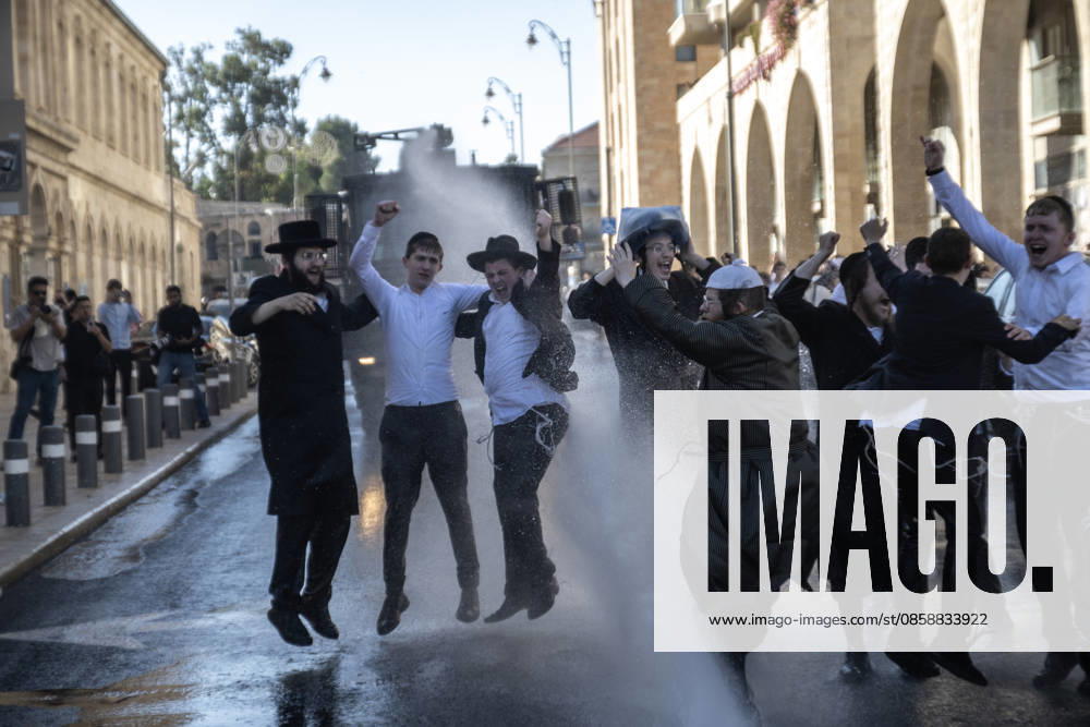 Police intervene as Ultra-Orthodox Jews block roads in West Jerusalem WEST JERUSALEM - JUNE 10: Israeli police use stun grenades and water cannons to disperse Ultra-Orthodox (Haredi) Jews blocking roads during a protest on June 10, 2026. Three demonstrators were detained during the incidents in West Jerusalem, where crowds gathered to protest against compulsory military service. Mostafa Alkharouf Anadolu Jerusalem Israel. Editorial use only. Please get in touch for any other usage.