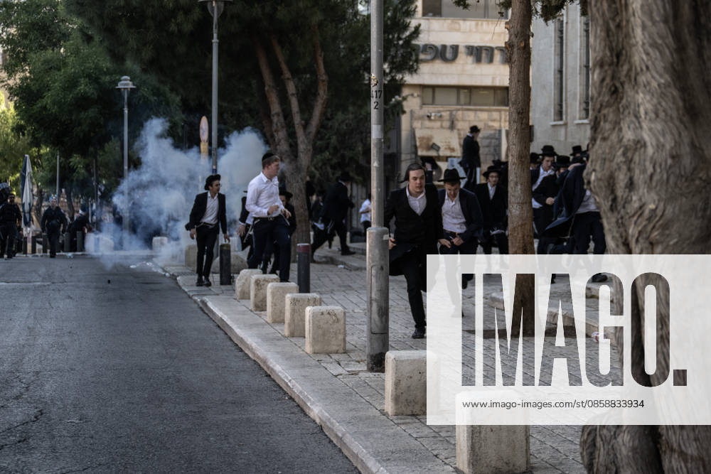 Police intervene as Ultra-Orthodox Jews block roads in West Jerusalem WEST JERUSALEM - JUNE 10: Israeli police use stun grenades and water cannons to disperse Ultra-Orthodox (Haredi) Jews blocking roads during a protest on June 10, 2026. Three demonstrators were detained during the incidents in West Jerusalem, where crowds gathered to protest against compulsory military service. Mostafa Alkharouf Anadolu Jerusalem Israel. Editorial use only. Please get in touch for any other usage.