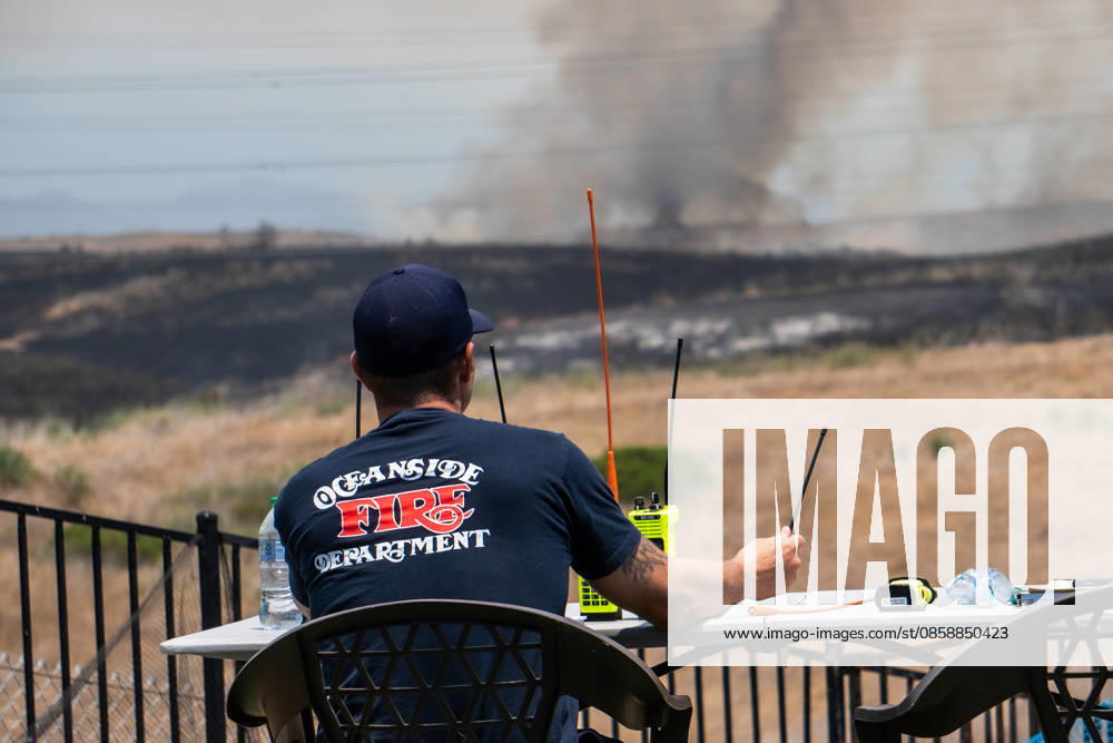 Fire crews battle the November Fire off Foussat Rd. in Oceanside, California, on June 10, 2026. Multiple resources were called to subdue the nearly 850 acre fire that borders Camp Pendleton and the Whelan Lake Audubon Society Preserve. Oceanside USA - ZUMAg219 20260610_znp_g219_011