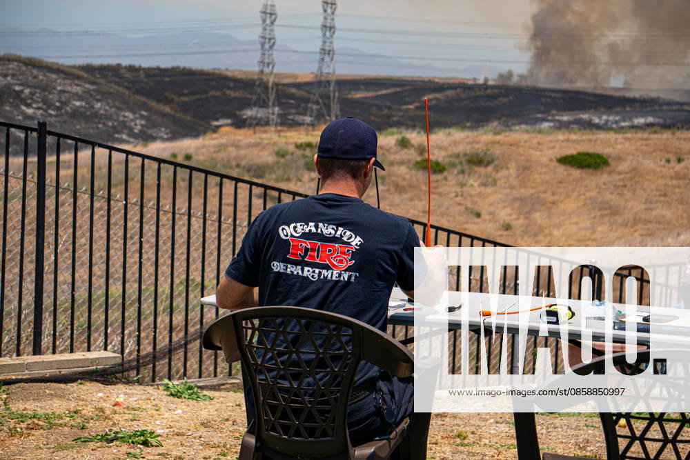 Fire crews battle the November Fire off Foussat Rd. in Oceanside, California, on June 10, 2026. Multiple resources were called to subdue the nearly 850 acre fire that borders Camp Pendleton and the Whelan Lake Audubon Society Preserve. Oceanside USA - ZUMAg219 20260610_znp_g219_007