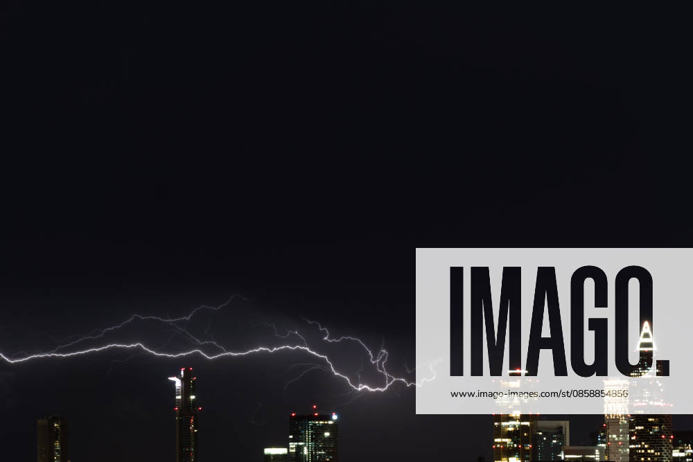 Lightning flashes over the financial district skyline during a thunderstorm in Frankfurt am Main, Germany. Frankfurt Germany - ZUMAb332 20260610_zip_b332_016