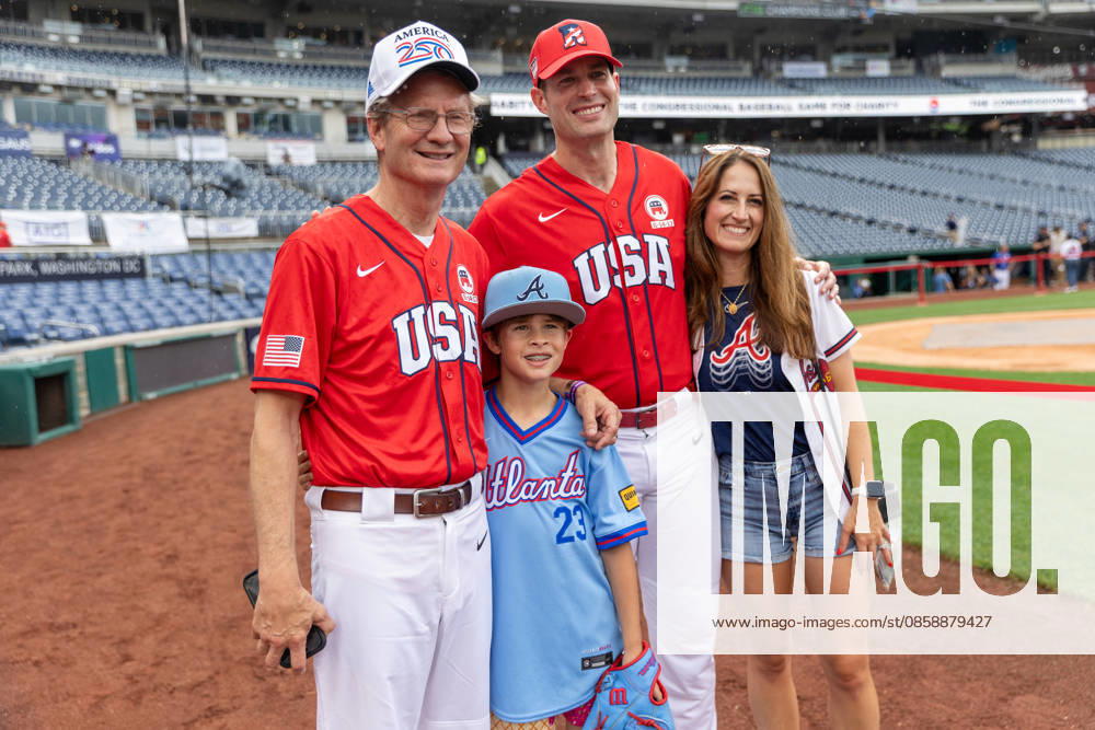 Congressional Baseball Game in Washington, DC WASHINGTON, DC, UNITED STATES - JUNE 10: Congressman Tim Burchett (R-TN) takes a photo with Congressman Clay Fuller (R-GA) and his wife and son, ahead of the Congressional Baseball Game at Nationals Park in Washington, DC, United States, on June 10, 2026. Nathan Posner Anadolu Washington, DC United States. Editorial use only. Please get in touch for any other usage.