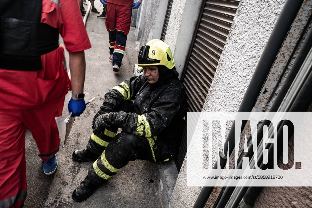 Ukrainian conflict KHARKIV, UKRAINE - JUNE 9 : Exhausted firefighter in Kharkiv, Ukraine, on June 9, 2026. Kharkiv kharkiv Oblast Ukraine