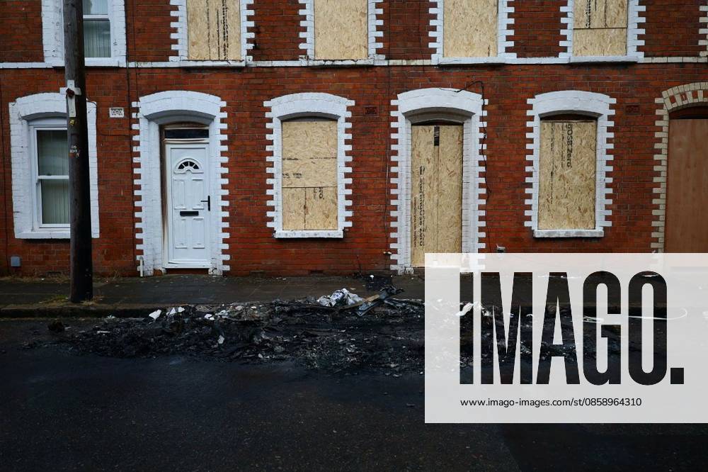 Aftermath in Belfast after 2 Days of Violence following the attemped Murder from a Sudanese Man in his 30s BELFAST, NORTHERN IRELAND - JUNE 11, 2026: Today, Thursday 11th of June 2026, the third day after the violence started in Belfast, triggered by the attempted murder by a stabbing by a Sudanese man in his 30s, no major incident or riot raised. The three burned cars that were assaulted by maily teenagers and then set on fire remain in Lendrik Street, East Belfast. After yesterday s fire, by Sandyknows Roundabout, the house remains completely gutted by the fire. Belfast United Kingdom of Great Britain and Northern Ireland