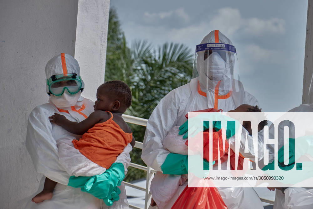 (260612) -- BUNIA, June 12, 2026 () -- Medical workers holding babies are pictured at an Ebola treatment center in Bunia, Ituri Province, the Democratic Republic of the Congo, June 9, 2026. The number of confirmed Ebola cases in the Democratic Republic of the Congo (DRC) has risen to 676, including 136 deaths, as health authorities warned of continued community transmission and the risk of a sudden geographic expansion of the outbreak. () DR CONGO-ITURI-EBOLA OUTBREAK-CONFIRMED CASES Xinhua