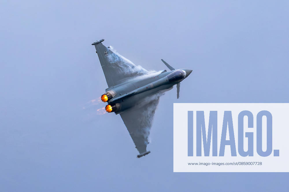 Trade visitor day at ILA Berlin 2026, Berlin, 12 06 2026 A Eurofighter Typhoon of the German Armed Forces in steep flight with enclosed afterburner and visible condensation cloud The fighter aircraft shows the Iron Cross of the German Air Force on the vertical tail Schöneberg Berlin ExpoCenter Airport Brandenburg Germany 20260612-1V9A2121-M4000