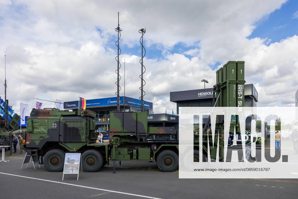 Trade visitor day at ILA Berlin 2026, Berlin, 12 06 2026 The ground-based air defense system IRIS T SLM on a military heavy-duty transporter with Bundeswehr marking The system is presented in the outdoor area of the fair, in the background the exhibitor pavilions of Hensoldt and Rheinmetall are visible Schöneberg Berlin ExpoCenter Airport Brandenburg Ger 20260612-286A9568-M4000