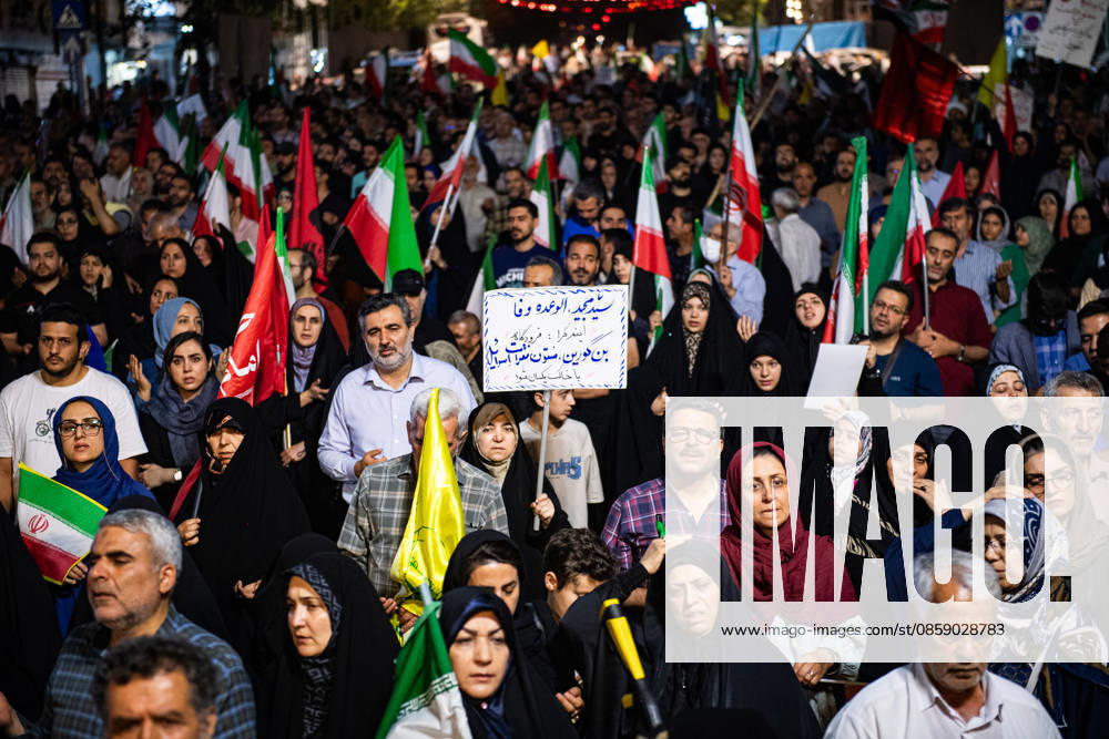 Iranians rally , waving flags in support of the government s negotiations to end the war with the United States, Anti?U.S. and anti?Israel chants echoed at Enghelab Square in Tehran late Friday, June 12, 2026. IRN2026061216 BehnamxTofighi