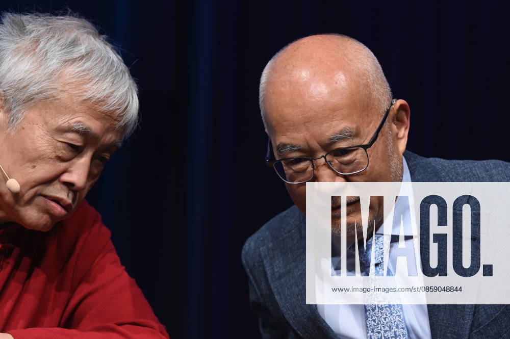 Translator Shi Ming and political scientist Wu Guoguang, l r, speaks at Phil Cologne, an international festival of philosophy on the topic of China as a great power - Wu Guoguang on Xi Jinpings global politics