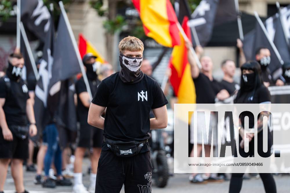 Rally of the ultranationalist group Nucleo Nacional in Barcelona BARCELONA, SPAIN - JUNE 13. Around 50 ultranationalists from Nucleo Nacional group gathered in front of the Spanish government delegation in Barcelona to protest the city s insecurity, which they attribute to immigration. During their speeches, they championed the Aryan race, stating they would fight even if it meant shedding blood, and the Nazi salute was seen. Barcelona Spain