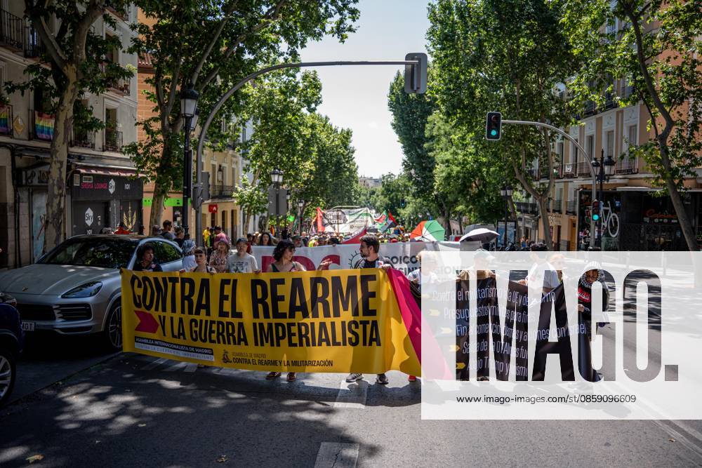 Demonstration in Madrid against rearmament and imperialist war Several people carry a banner with the slogan Against rearmament and imperialist war during a demonstration to protest against rearmament and imperialist war, on June 14, 2026, in Madrid Spain The call is part of the international context of escalating war, In the Spanish state, military spending has increased by 50 percent - the second largest increase in the EU - while the government keeps the Rota and Morón bases active, continues to buy arms from Israel and reinforces its commitment to NATO 14 JUNE 2026 PACIFISM DEMONSTRATION Madrid Madrid Spain