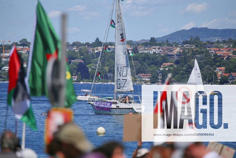 Anti G7 protest Demonstrators protest against the G7 Summit 2026, which is taking place in neighboring Évian les Bains, France A sail of a boat on Lake Geneva reads No G7