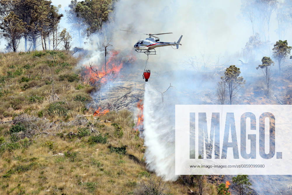 Wildfire continues to burn in Sicily s Trapani region as aerial response intensifies TRAPANI, ITALY - JUNE 14: Firefighting aircraft and helicopters operate to extinguish a wildfire that broke out in a maquis area near the Grande Montagna location in Trapani, on the west of Italy s Sicily Island, on June 14, 2026. The wildfire, which started yesterday afternoon, continues to spread despite ongoing aerial and ground efforts. Alberto Lo Bianco Anadolu Trapani Italy. Editorial use only. Please get in touch for any other usage.