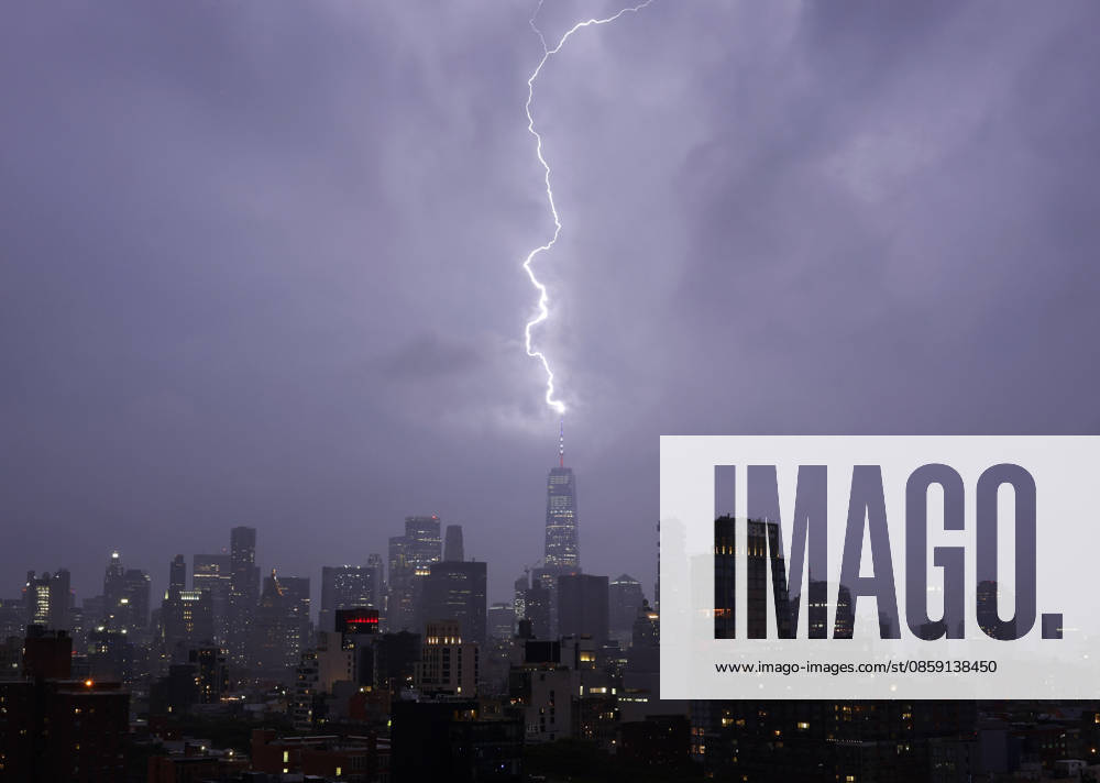 #2 A bolt of lightning hits the spire at the top of One World Trade Center in the Manhattan Skyline as thunderstorms pass through on Sunday, June 14, 2026 in New York City. NYP20260614103 JOHNxANGELILLO