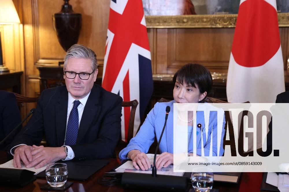 #2 Japan PM Takaichi at roundtable meeting in London Japanese Prime Minister Sanae Takaichi (R) and her British counterpart Keir Starmer attend a business roundtable meeting in Downing Street in London on June 14, 2026. (Pool photo) A14AA0005618811P