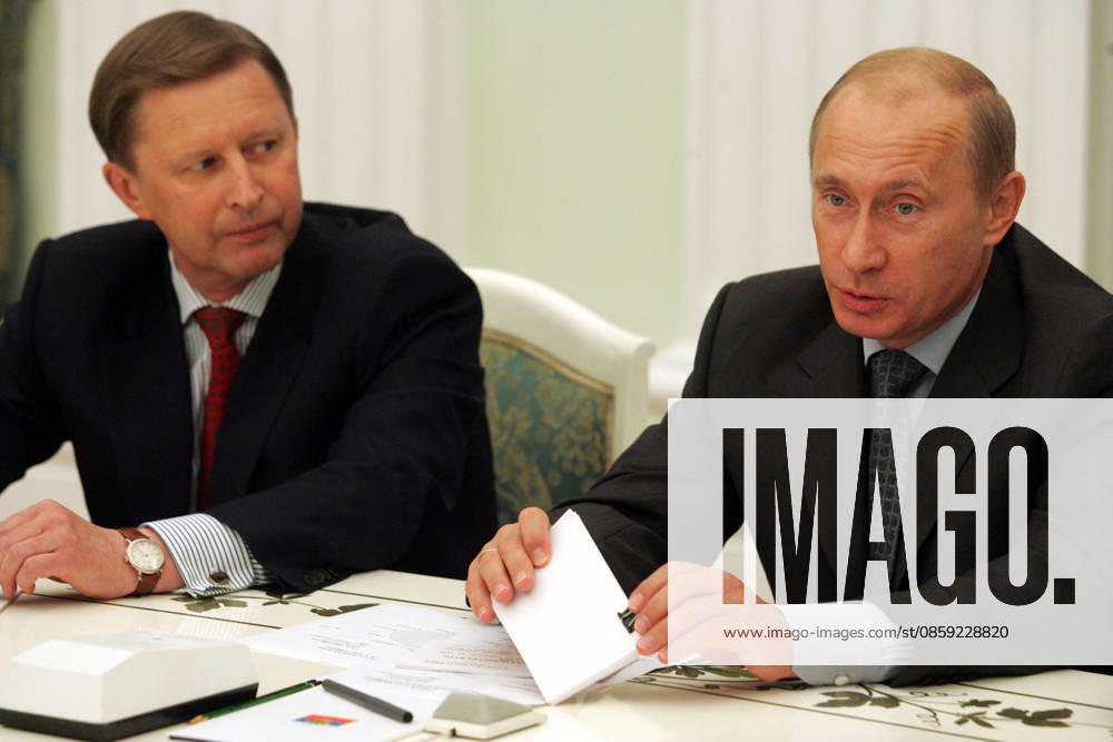 Vladimir Putin and Sergei Ivanov Vladimir Putin and Russian Defence Minister Sergei Ivanov while the meeting with NATO Secretary-General Jaap de Hoop Scheffer in Moscow.