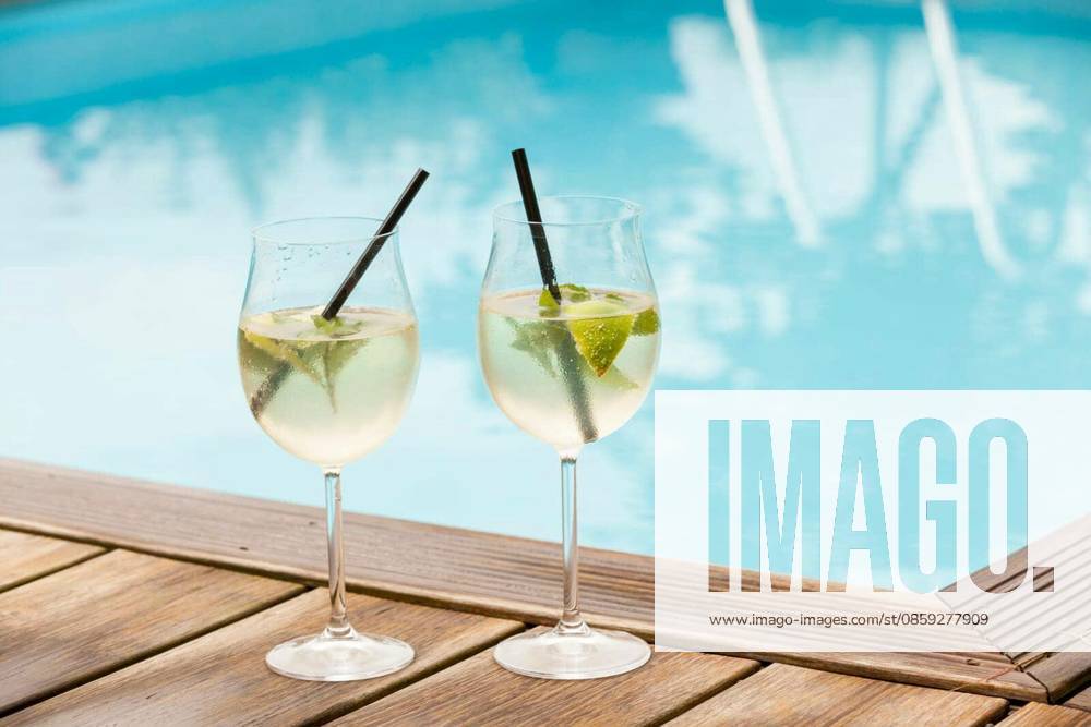 Fresh Hugo with mint lime and sparkling wine in a wine-weinin in summer by the water