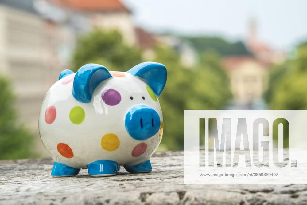 Piggy bank over Munich, symbolic photo, tight budget situation for the City of Munich, savings must be made everywhere, Munich, June 2026, Germany, Munich, June 2026, Piggy bank in Munich, standing on the Prinzregent Luitpold Terrace, view across Prinzregente