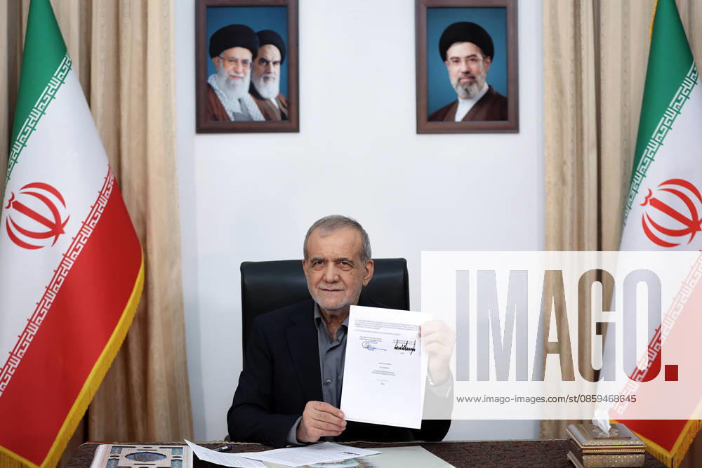 Iranian President Pezeshkian signs agreement aimed at ending Iran-U.S. conflict TEHRAN, IRAN - JUNE 18: (---- – MANDATORY CREDIT - IRANIAN PRESIDENCY HANDOUT - NO MARKETING NO ADVERTISING CAMPAIGNS - DISTRIBUTED AS A SERVICE TO CLIENTS----) Iranian President Masoud Pezeshkian signs a memorandum of understanding aimed at ending the war between Iran and the United States, brokered by Pakistan, at his office in Tehran, Iran, on June 18, 2026. Iranian Presidency Anadolu Tehran Iran. Editorial use only. Please get in touch for any other usage.