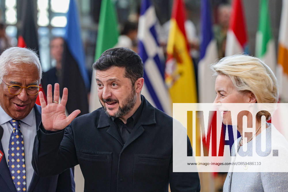 VOLODYMYR ZELENSKYY, President of Ukraine waves goodbye to press as he walks with URSULA VON DER LEYEN, President of the European Commission (R) and ANTONIO COSTA, President of the European Council (L) walk out together ahead of a roundtable meeting during the first night of the European Council Summit in Brussels. The summit comes days after EU leaders agreed to open the first accession negotiation cluster with Ukraine and Moldova, with Ukraine, European defence and security, and continued support for Kyiv among the main issues on the agenda. Brussels European Union - ZUMAo116 20260618_znp_o116_055