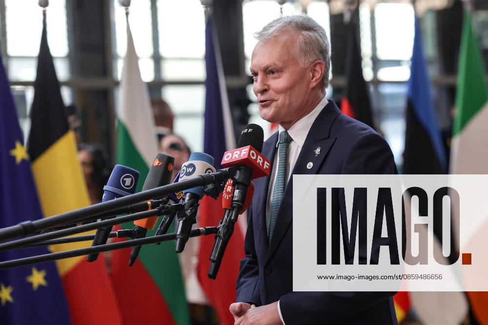 GITANAS NAUSEDA, President of the Republic of Lithuania, walks out to greet the press ahead of a roundtable meeting during the first night of the European Council Summit in Brussels. Lithuania is expected to emphasise continued support for Ukraine, stronger pressure on Russia and greater European defence readiness, including security along the EUâ€⠢s eastern flank. Brussels European Union - ZUMAo116 20260618_znp_o116_062