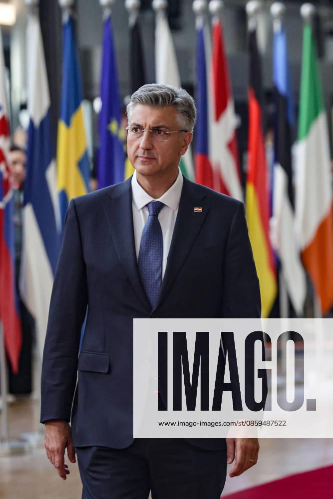 ANDREJ PLENKOVIC, Prime Minister of Croatia, walks out to greet the press ahead of a roundtable meeting during the first night of the European Council Summit in Brussels. Croatia is expected to focus on European competitiveness, defence and security, migration, enlargement and the EUâ€⠢s next long-term budget, alongside wider discussions on Ukraine and the Middle East. Brussels European Union - ZUMAo116 20260618_znp_o116_074