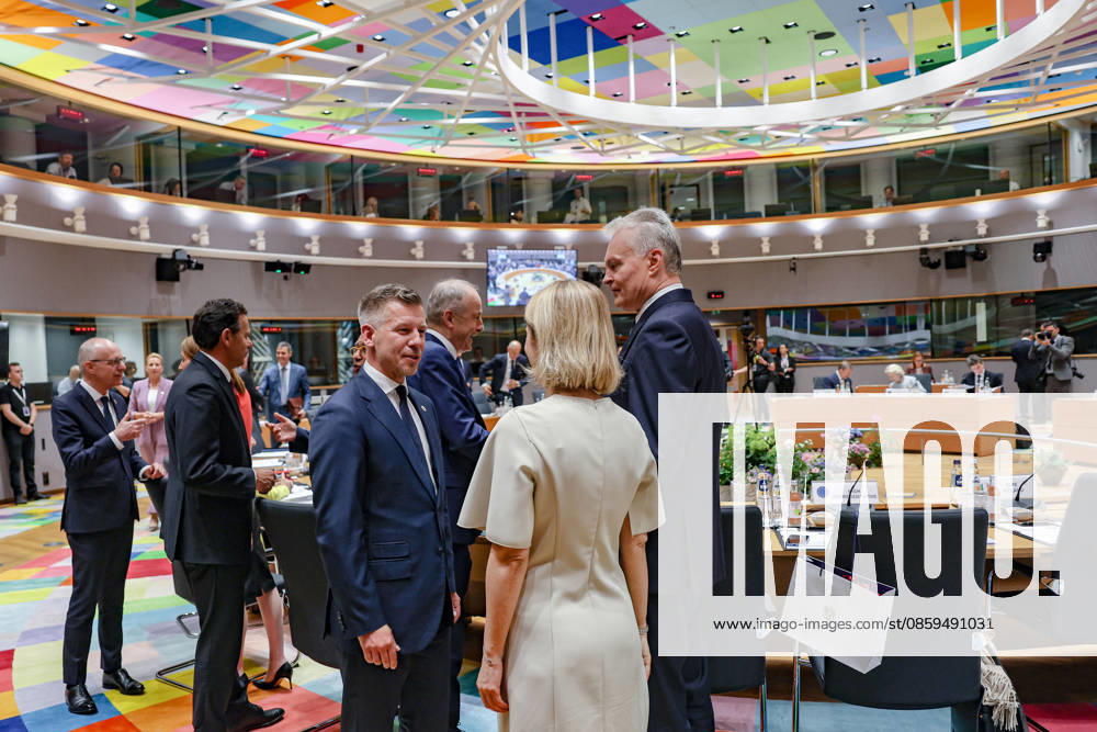 PETER MAGYAR, Prime Minister of Hungary, speaks with KAJA KALLAS, EU High Representative for Foreign Affairs and Security Policy with GITANAS NAUSEDA, President of the Republic of Lithuania standing beside inside the European Council during the European Council Summit in Brussels. Magyar attends his first European Council summit as HungaryÃ¢â‚¬â ¢s prime minister. Brussels European Union - ZUMAo116 20260618_znp_o116_121